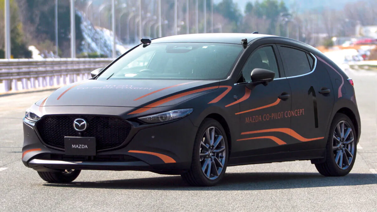 This photo provided by Mazda Motor Corp., shows the Mazda Co-Pilot Concept car in Miyoshi, Hiroshima prefecture, western Japan, on Sept. 30, 2021. Cars already know how to park themselves, warn drowsy drivers, steer back into the right lanes and propose map routes to destinations. The cars Mazda has in the works for next year in Japan know when drivers have a stroke or heart attack. (Mazda Motor Corp. via AP)