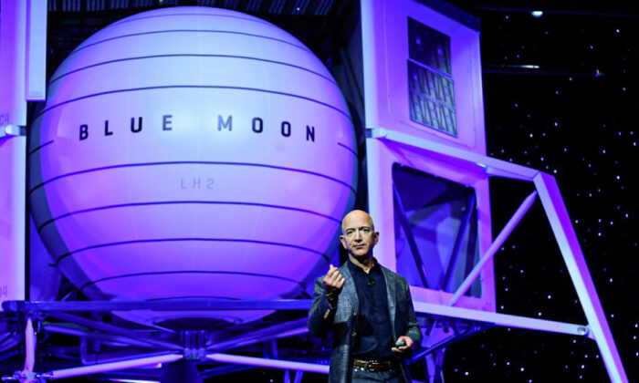 Founder, Chairman, CEO and President of Amazon Jeff Bezos unveils his space company Blue Origin's space exploration lunar lander rocket called Blue Moon during an unveiling event in Washington, on May 9, 2019. (Clodagh Kilcoyne/Reuters)