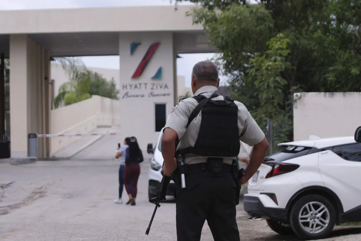 Government forces guard the entrance of hotel after an armed confrontation near Puerto Morelos, Mexico, on Nov. 4, 2021. (Karim Torres/AP Photo)