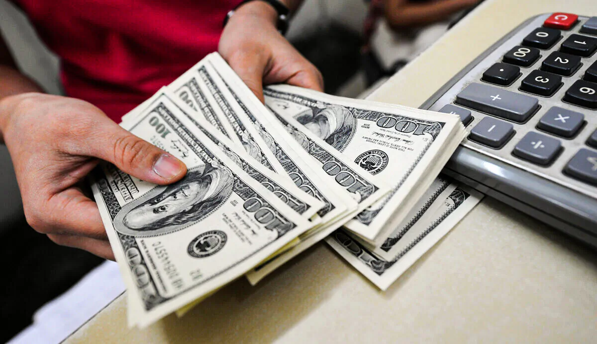 U.S. dollar notes are seen on Aug. 28, 2009. (Hoang Dinh Nam/AFP via Getty Images)