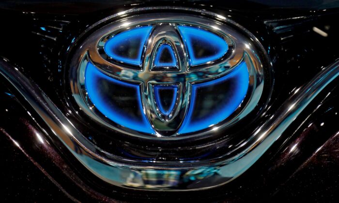 The Toyota logo is seen connected  the bonnet of a recently  launched Camry Hybrid electrical  conveyance  astatine  a edifice  successful  New Delhi, India connected  Jan. 18, 2019. (Anushree Fadnavis/Reuters)