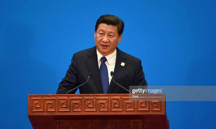 China's Chairman Xi Jinping speaks at the closing press conference of the Asian-Pacific Economy Cooperation (APEC) Summit outside of Beijing, China, on Nov. 11, 2014. (Goh Chai Hin/Getty Images) 