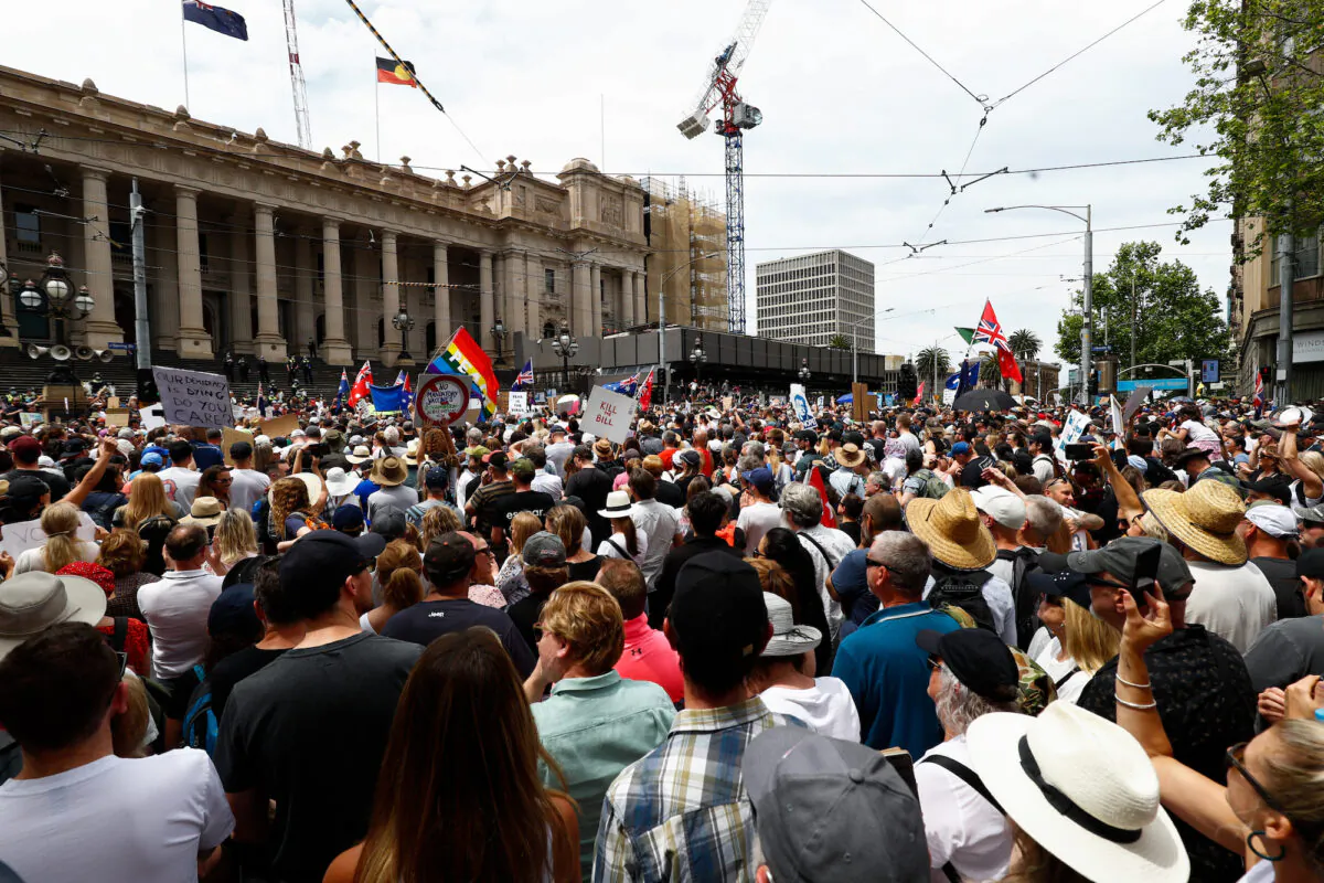 Members of the 'Vic Freedom Movement' group participate in a protest in Melbourne, Australia, on Nov. 6, 2021. (AAP Image/Con Chronis)