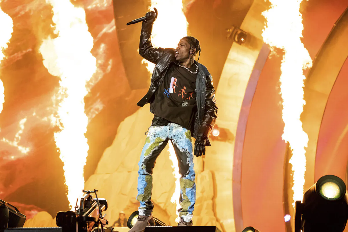 Travis Scott performs at Day 1 of the Astroworld Music Festival at NRG Park in Houston, on Nov. 5, 2021. (Amy Harris/Invision/AP)