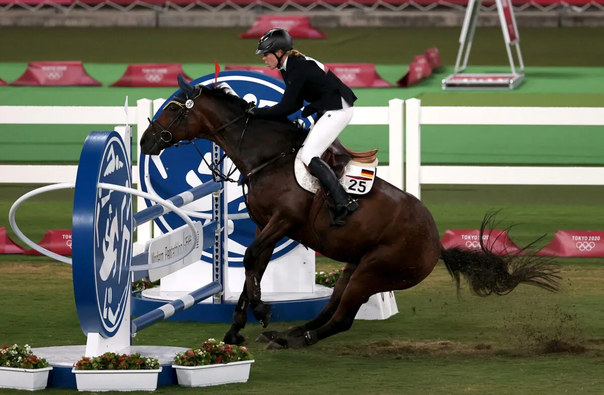 Annika Schleu of Germany in action. Tokyo 2020 Olympics, Tokyo Stadium, in Tokyo, Japan,  Aug. 6, 2021. (Ivan Alvarado/Reuters, File Photo)