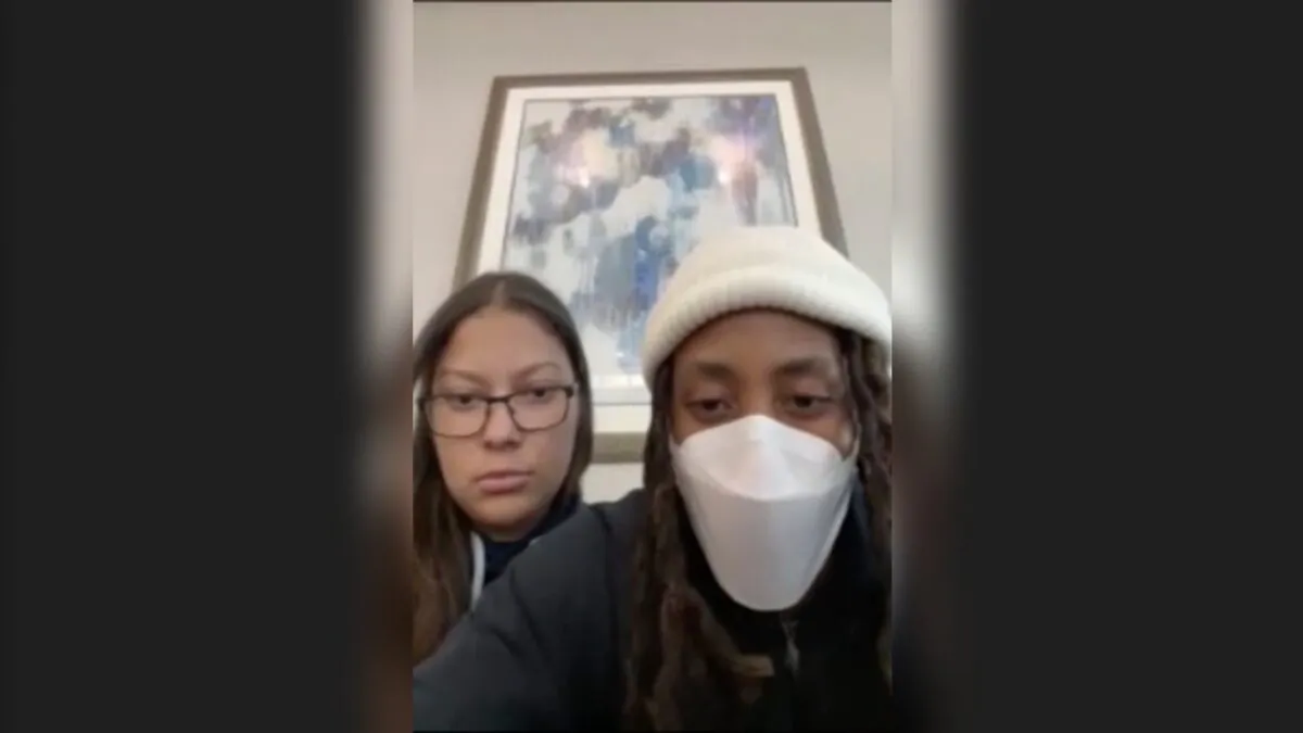 Ariel (L) and Shawn Little of New York talk about their experience at the Astroworld music festival in this still from video. (Shawn Little via AP)