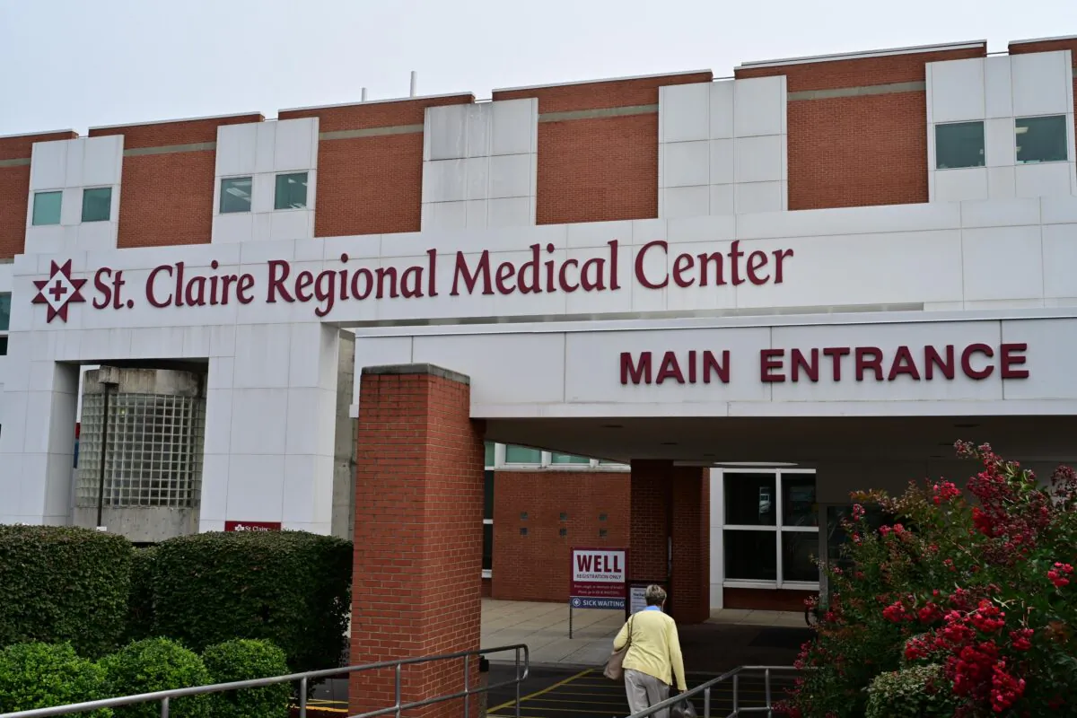 A person walks toward the main entrance of St. Claire Regional Medical Center in Morehead, Ky., on Sept. 16, 2021. (Jon Cherry/Getty Images)