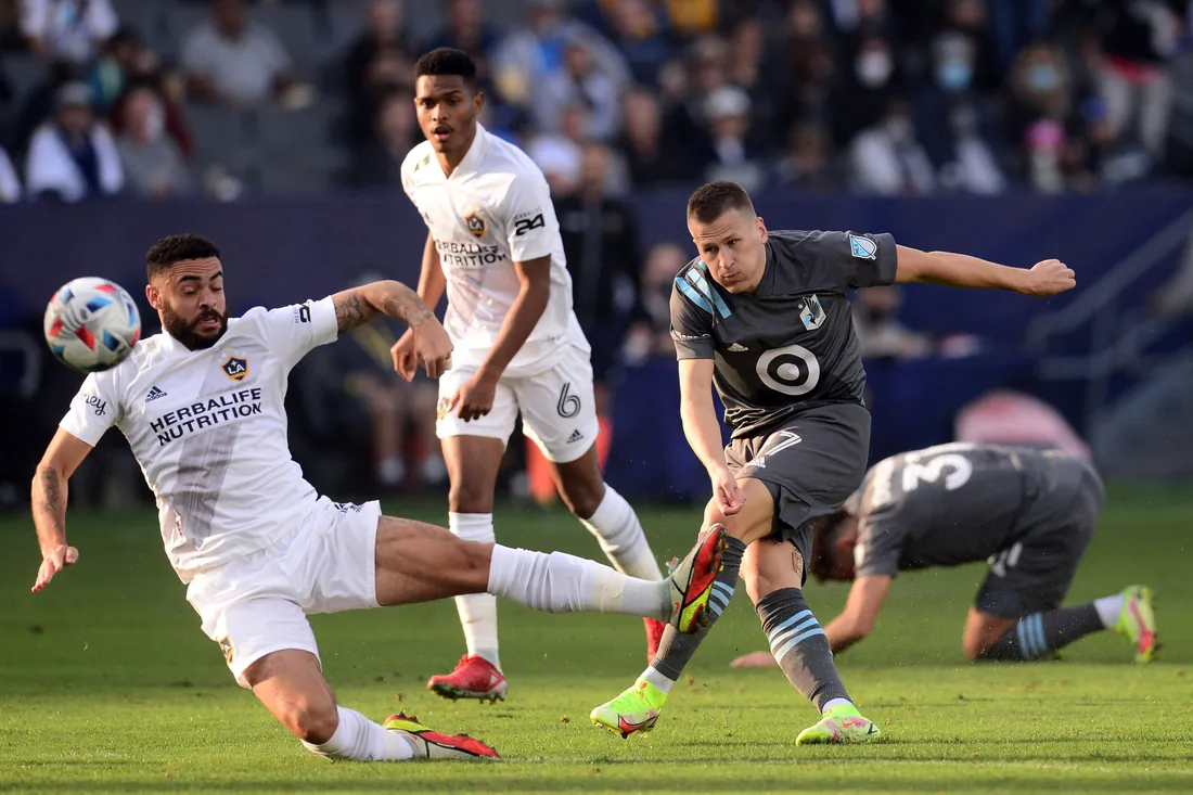 Minnesota United midfielder Robin Lod (17) shoots the ball by Los Angeles Galaxy defender Derrick Williams (3) during the first half at Dignity Health Sports Park in Carson, Calif., on Nov 7, 2021. (Joe Camporeale-USA TODAY Sports via Field Level Media)
