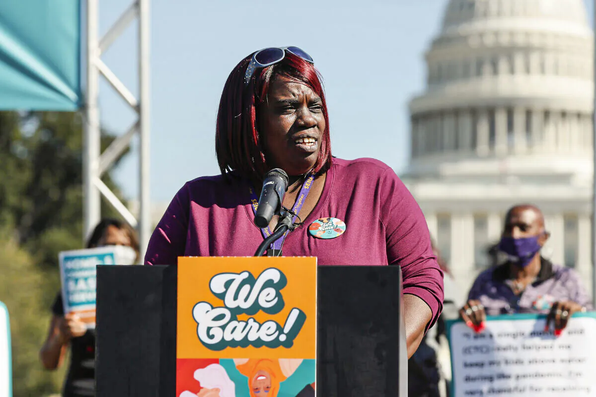WASHINGTON, DC - OCTOBER 21: Latonya Jones-Costa, SEIU member, along with members of Congress, parents and caregiving advocates hold a press conference supporting Build Back Better investments in home care, childcare, paid leave and expanded CTC payments in front of the U.S. Capitol Building on October 21, 2021 in Washington, DC. (Photo by Paul Morigi/Getty Images for MomsRising Together)