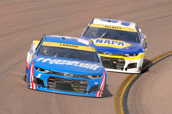 Kylr Larson leads Chase Elliott during a NASCAR auto race