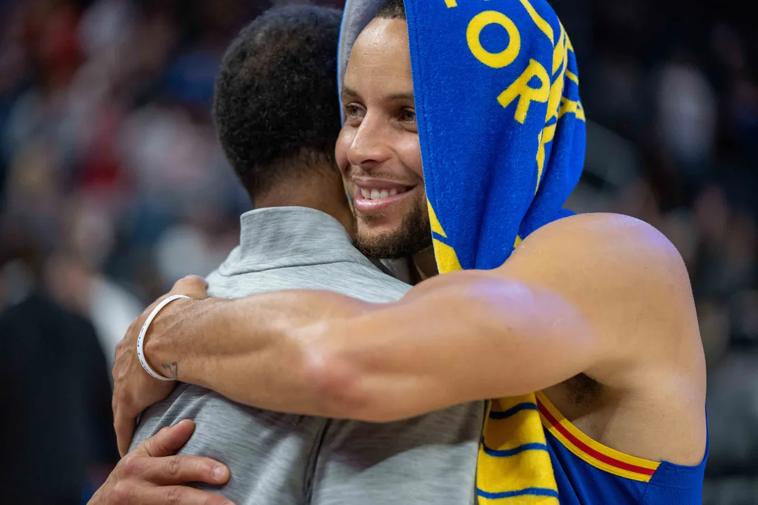 Golden State Warriors guard Stephen Curry (30) hugs Houston Rockets head coach Stephen Silastt after the game at Chase Center in San Francisco on Nov. 7, 2021. (Neville E. Guard/USA TODAY Sports via Field Level Media)