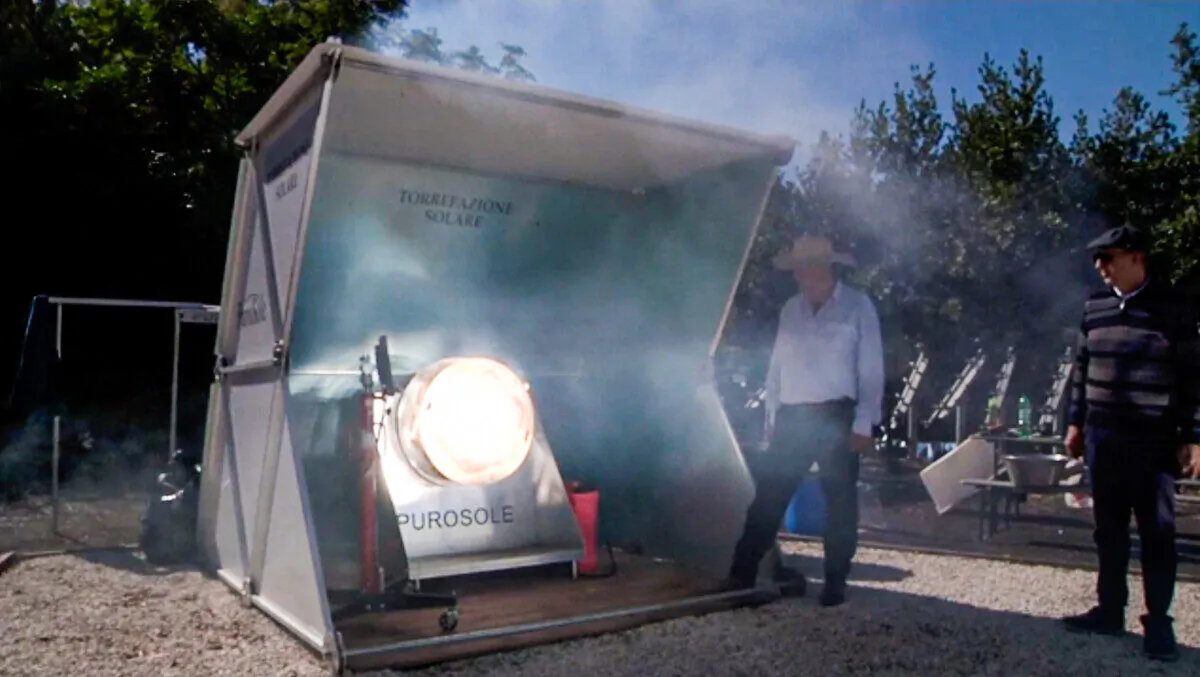 Coffee beans roast inside the steel roasting basket of a PuroSole coffee roasting solar plant in Rome in a still from video taken on Oct. 13, 2021. (AP/Screenshot via The Epoch Times)