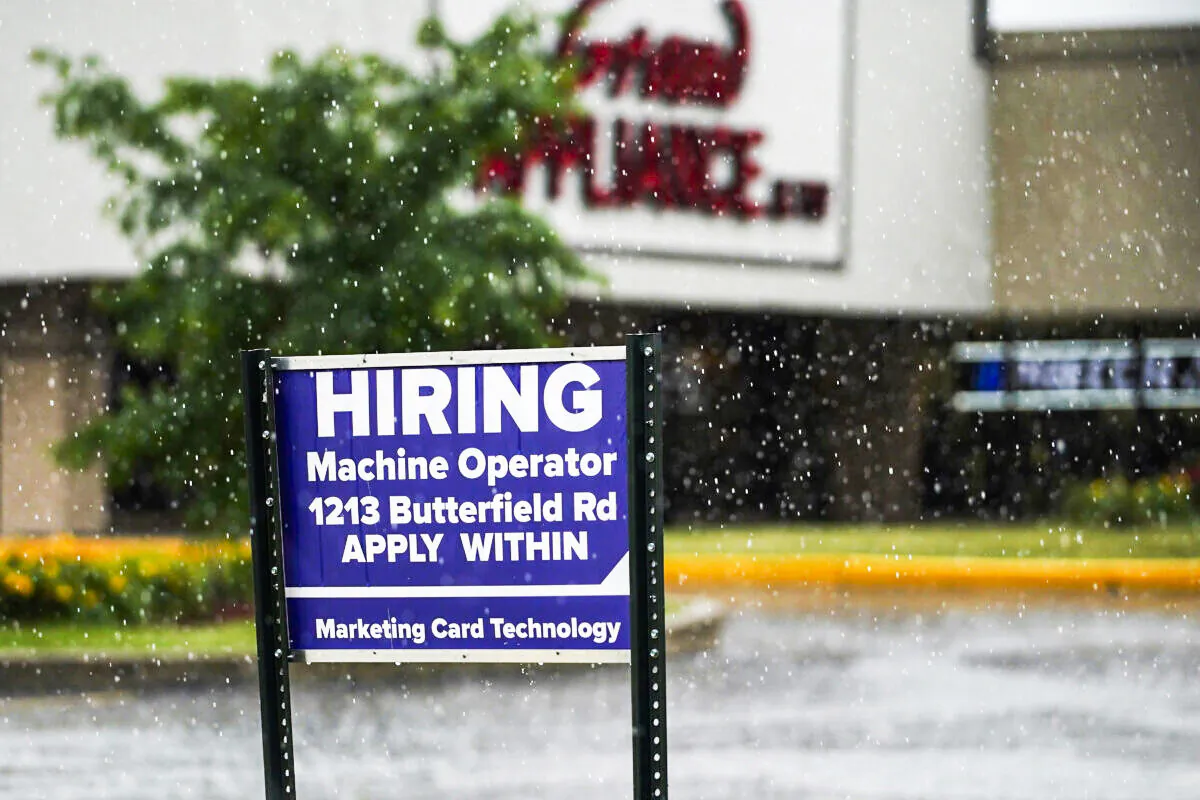 A hiring sign is displayed in Downers Grove, Ill., on June 24, 2021. (Nam Y. Huh/AP Photo)