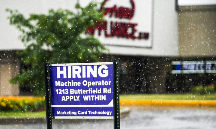 A hiring sign is displayed in Downers Grove, Ill., on June 24, 2021. (Nam Y. Huh/AP Photo)