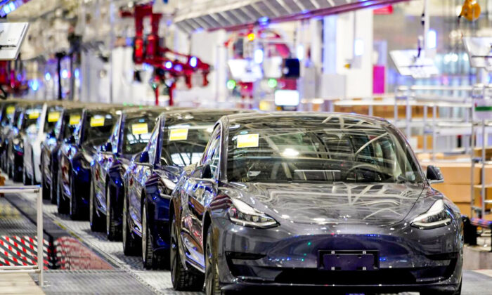 Tesla China-made Model 3 vehicles are seen during a delivery event at its factory in Shanghai, China on Jan. 7, 2020. (Aly Song/Reuters)