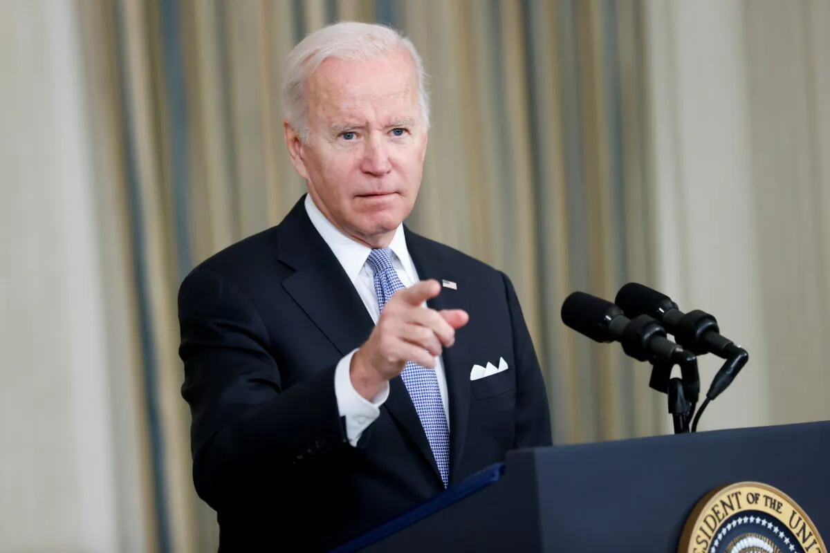 U.S. President Joe Biden gestures as he delivers remarks after late-night passage of a $1 trillion infrastructure bill to repair the nation's airports, roads and bridges, at the White House, on Nov. 6, 2021. (Jonathan Ernst/Reuters)