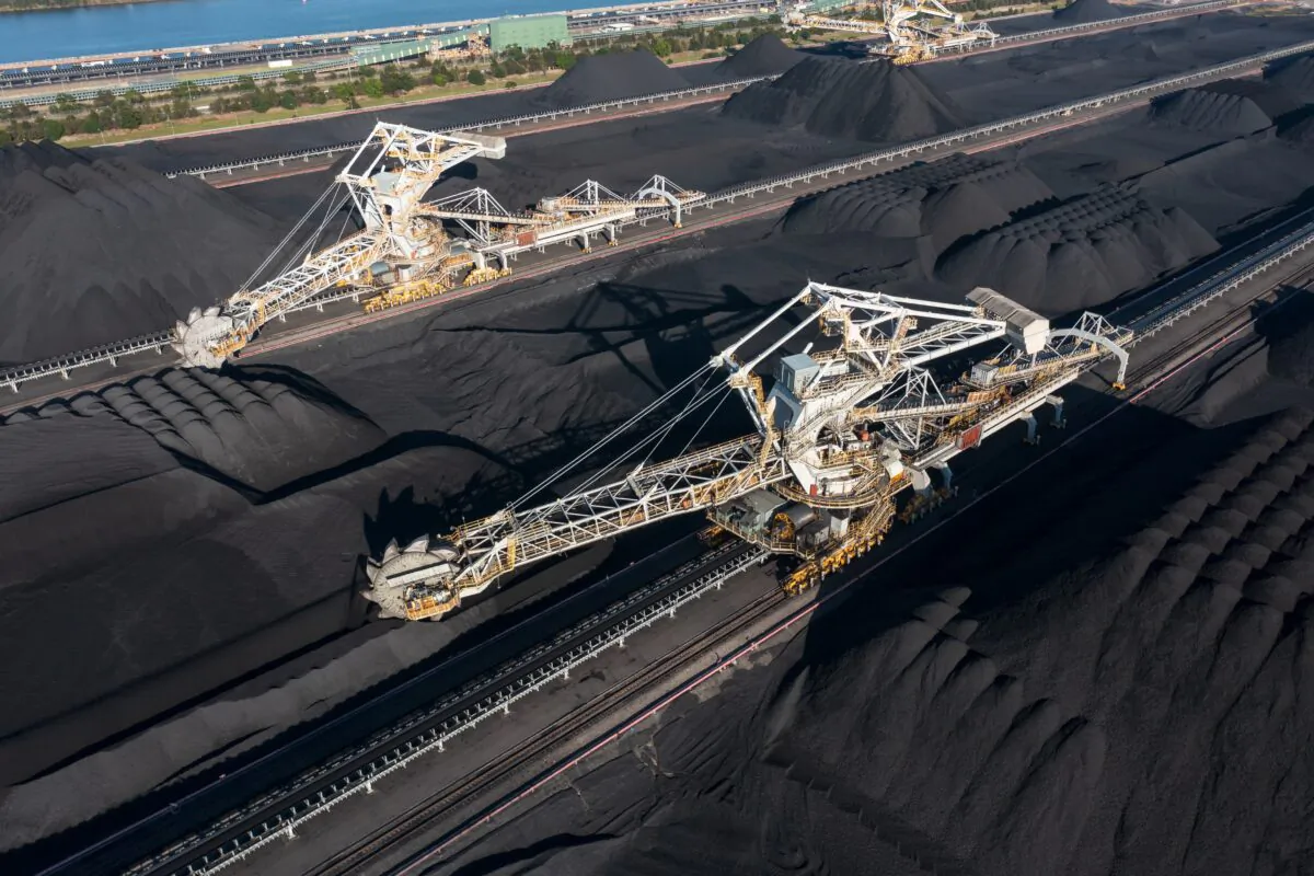 Bulk coal scoop conveyors and coal stockpiles at the Port of Newcastle in New South Wales, Australia. (Harlz/Adobe Stock)