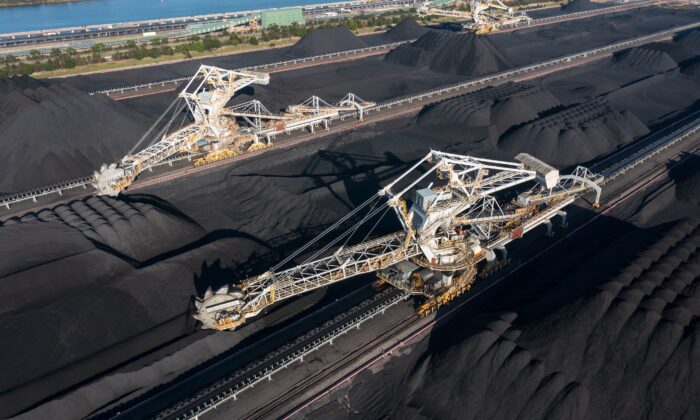 Bulk coal scoop conveyors and coal stockpiles at the Port of Newcastle in New South Wales, Australia. (Harlz/Adobe Stock)