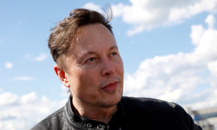 SpaceX founder and Tesla CEO Elon Musk looks on as he visits the construction site of Tesla's gigafactory in Gruenheide, near Berlin, Germany, on May 17, 2021. (Michele Tantussi/Reuters)