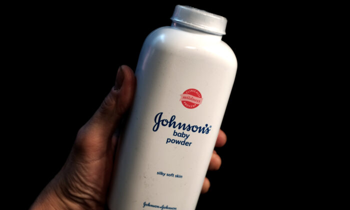 A bottle of Johnson and Johnson Baby Powder is seen in a photo illustration taken in New York, on Feb. 24, 2016. (Mike Segar/Illustration/Reuters)