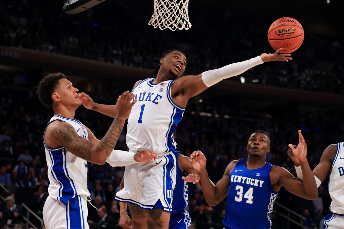 Duke Blue Devils guard Trevor Keels (1) rebounds in front of Kentucky Wildcats forward Oscar Tshiebwe (34) during the first half at Madison Square Garden in New York, on Nov. 9, 2021. (Vincent Carchietta-USA TODAY Sports via Reuters)