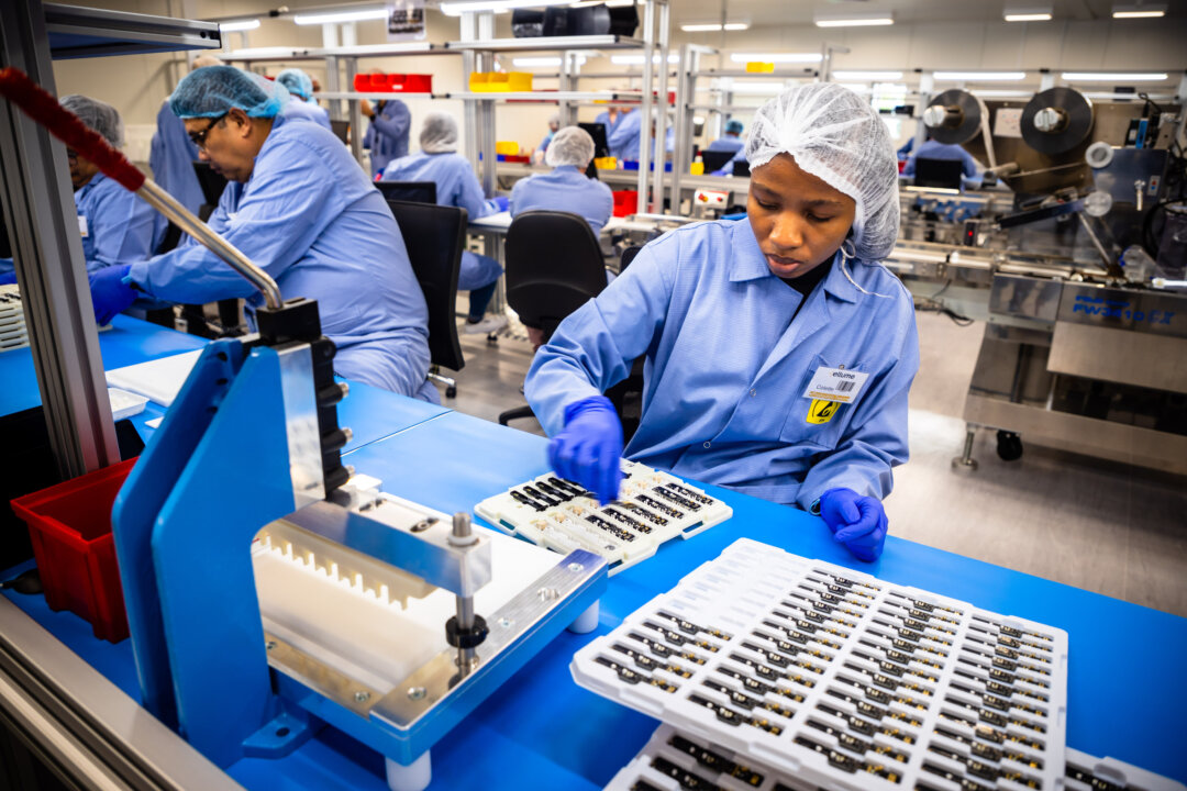 Ellume's COVID-19 coronavirus home test units are seen at a digital diagnostics company in Australia, on Dec. 21. 2020. (Patrick Hamilton/AFP via Getty Images)