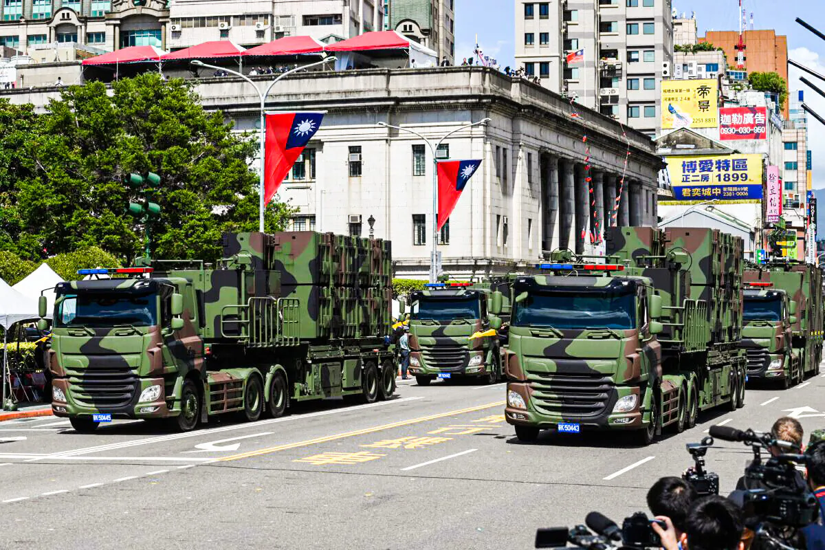 Taiwanese military vehicles take part in a national day parade in front of the Presidential Palace in Taipei on Oct. 10, 2021. (Sam Yeh/AFP via Getty Images)