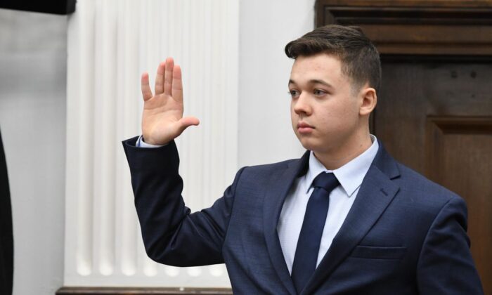 Kyle Rittenhouse is sworn in to testify during his trial at the Kenosha County Courthouse in Kenosha, Wis., on Nov. 10, 2021.  (Mark Hertzberg-Pool/Getty Images)