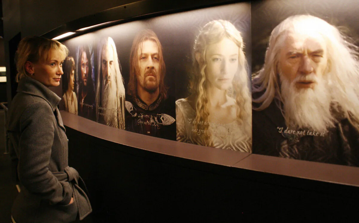 A woman looks at the different characters from the film "The Lord of the Rings" at an exhibition in Potsdam, Germany, on Jan. 30, 2007. (Michael Urban /DDP/AFP via Getty Images)