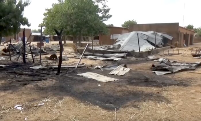Burnt structure after a school fire "AFN" In Maradi, Niger, with a still image from the video on November 8, 2021.  (AP / Screenshot via NTD)