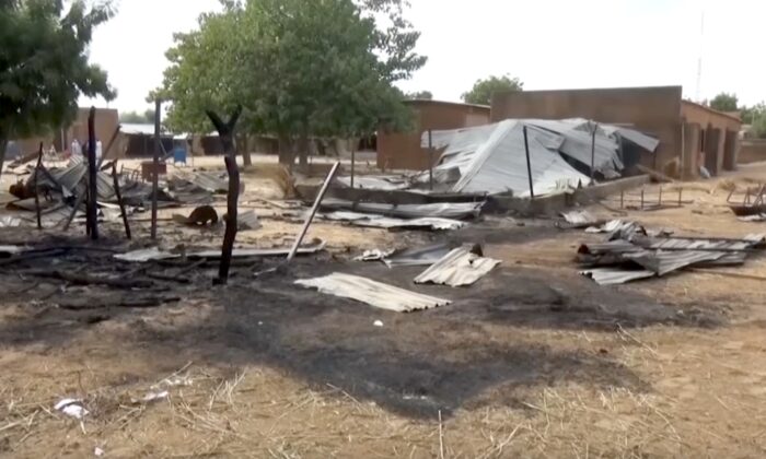 Burned structure after a fire at school "AFN" in Maradi, Niger, on Nov. 8, 2021, in a still from video. (AP/Screenshot via NTD)