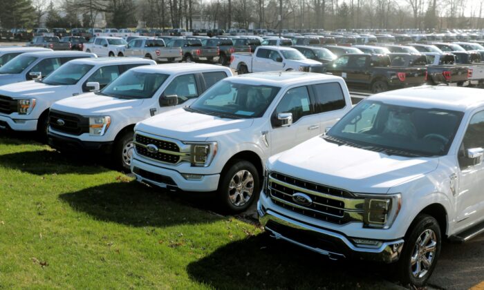 Newly manufactured Ford Motor Co. F-150 pick-up trucks are seen waiting for missing parts in Dearborn, Mich., on March 29, 2021. (Rebecca Cook/Reuters)