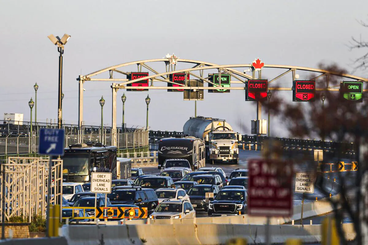 Cars line up at a checkpoint after crossing the Peace Bridge into the United States from Canada in Buffalo, N.Y., on Nov. 8, 2021. (Joshua Bessex/AP Photo)