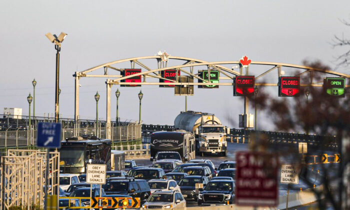 Cars line up at a checkpoint after crossing the Peace Bridge into the United States from Canada in Buffalo, N.Y., on Nov. 8, 2021. (Joshua Bessex/AP Photo)