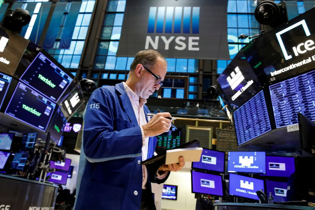 A trader works on the floor of the New York Stock Exchange (NYSE) in New York City on Nov. 8, 2021. (Brendan McDermid/Reuters)