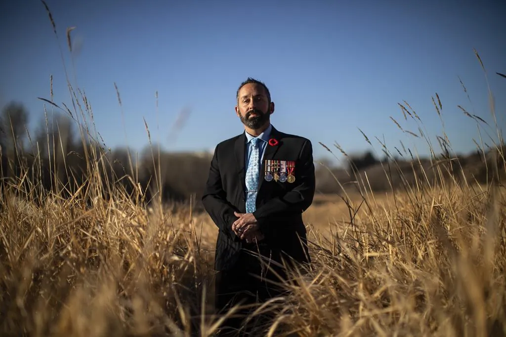 Stephen Peddle poses in St. Albert, Alta. on November 10, 2021. Peddle recently retired from a 28-year career with the Canadian military after assisting interpreter Sangeen Abdul Mateen and his family to come to Canada. (The Canadian Press/Jason Franson)