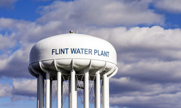The Flint Water Plant water tower is seen in Flint, Mich., on March 21, 2016. (AP Photo/Carlos Osorio, File)