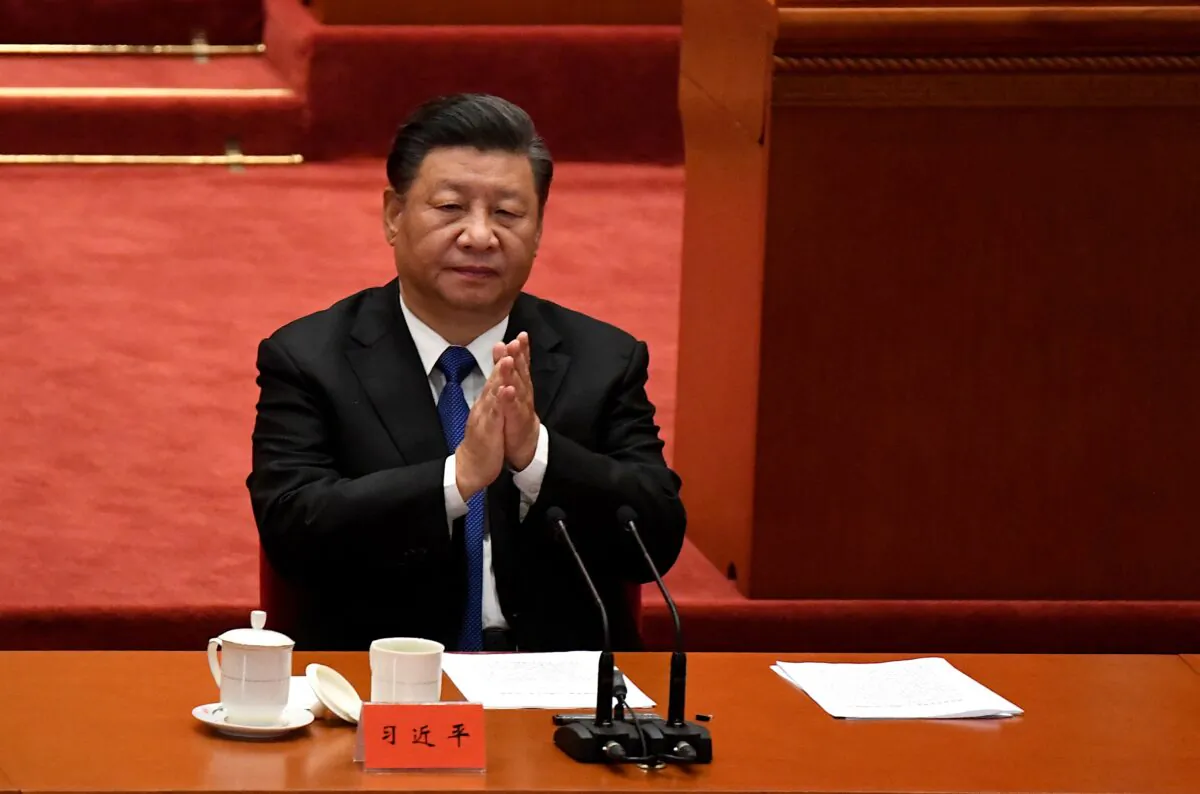 Chinese regime leader Xi Jinping in the Great Hall of the People in Beijing on Oct. 9, 2021. (Noel Celis/AFP via Getty Images)