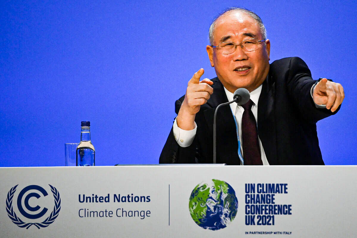 China's special climate envoy, Xie Zhenhua speaks during a joint China and US statement on a declaration enhancing climate action in the 2020's on day eleven of the COP26 climate change conference at the SEC in Glasgow, Scotland, on Nov. 10, 2021. (Jeff J Mitchell/Getty Images)