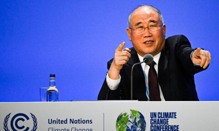 China's special climate envoy, Xie Zhenhua speaks during a joint China and US statement on a declaration enhancing climate action in the 2020's on day eleven of the COP26 climate change conference at the SEC in Glasgow, Scotland, on Nov. 10, 2021. (Jeff J Mitchell/Getty Images)