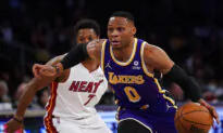 Lakers Rally Late in Regulation, Hold Off Heat 120–117 in OT