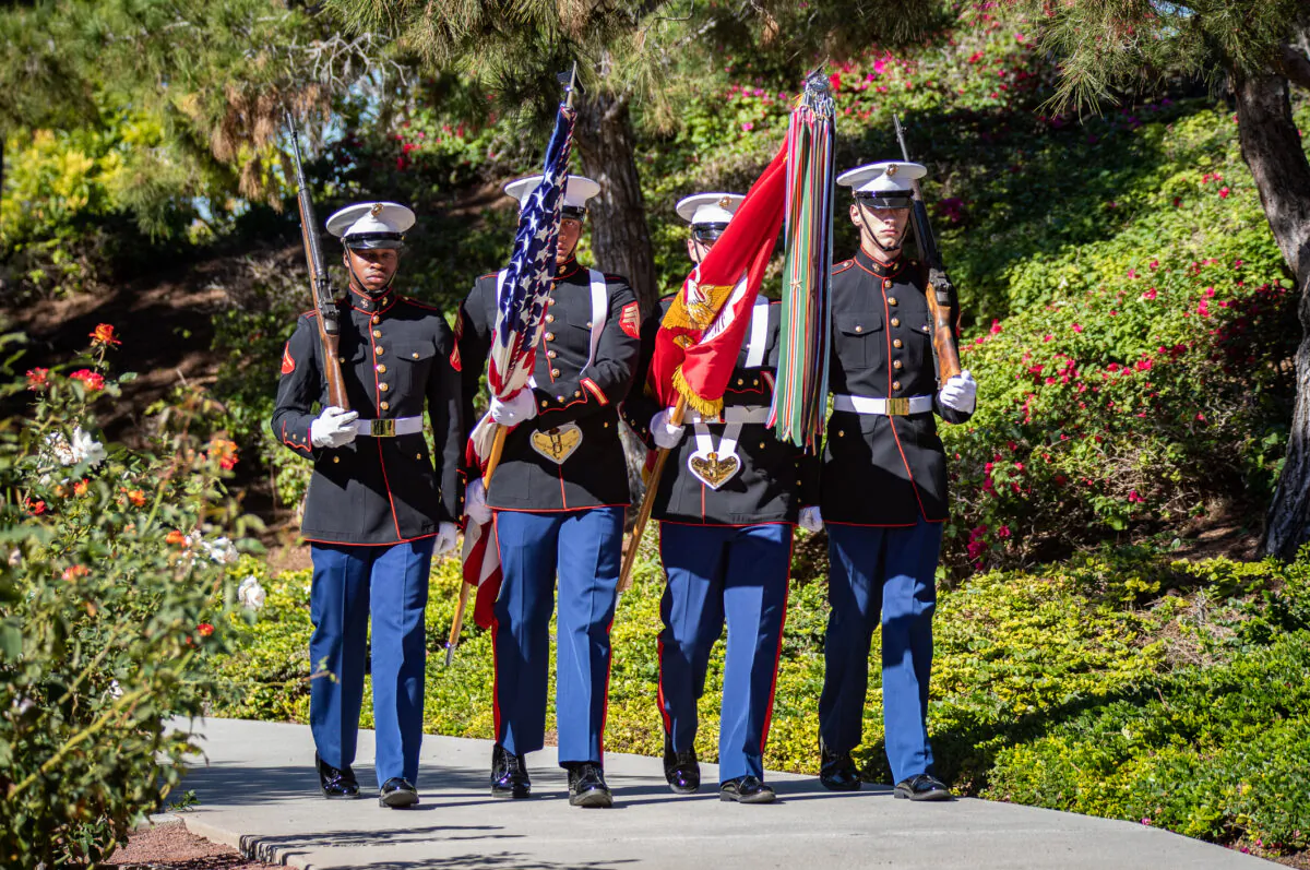 Veterans and civilians celebrate Veterans Day in Irvine, Calif., on Nov. 11, 2021. (John Fredricks/The Epoch Times)