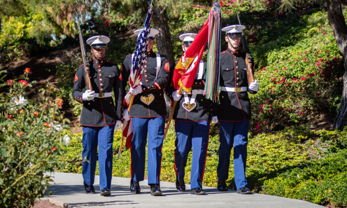 Veterans and civilians celebrate Veterans Day in Irvine, Calif., on Nov. 11, 2021. (John Fredricks/The Epoch Times)
