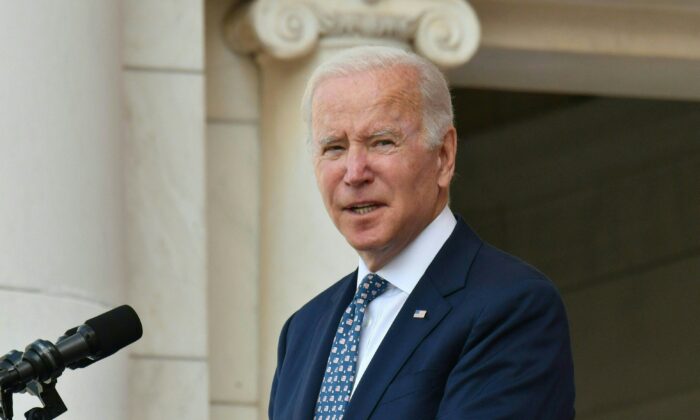 President Joe Biden speaks during an event to commemorate Veterans Day in the Memorial Amphitheater, at Arlington National Cemetery in Arlington, Va., on Nov. 11, 2021. (Nicholas Kamm/AFP via Getty Images)