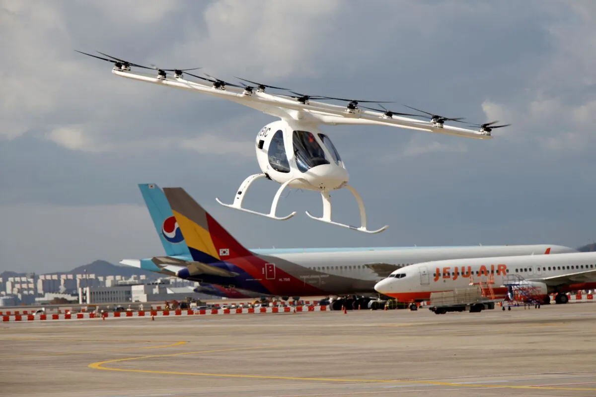 A test flight of the "Volocopter 2X" drone taxi during an Urban Air Mobility Airport Demo event at Gimpo Airport in Seoul, South Korea on Nov. 11, 2021. (Heo Ran/Reuters)