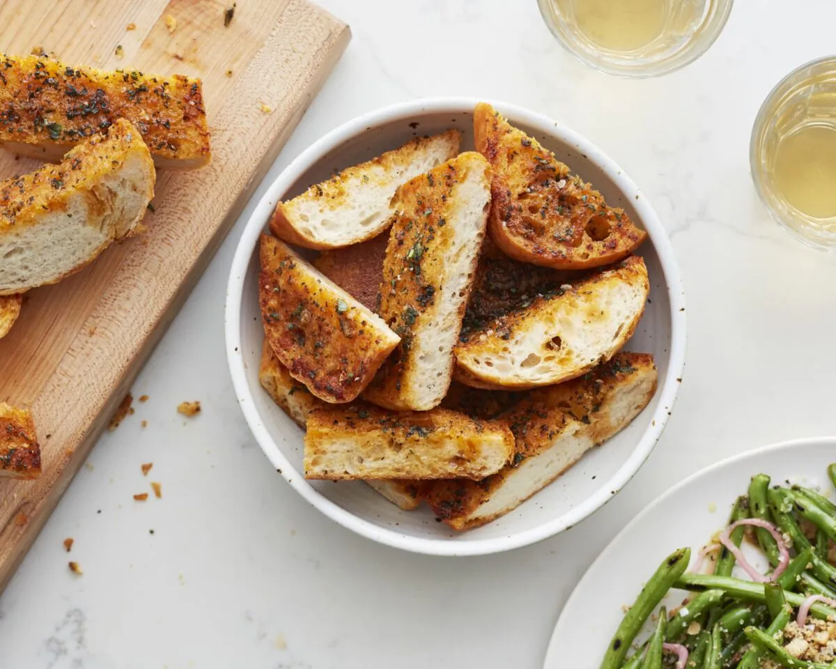 Brown sugar adds a surprising hint of sweetness to the garlic butter in this recipe. (Ghazalle Badiozamani/TNS)
