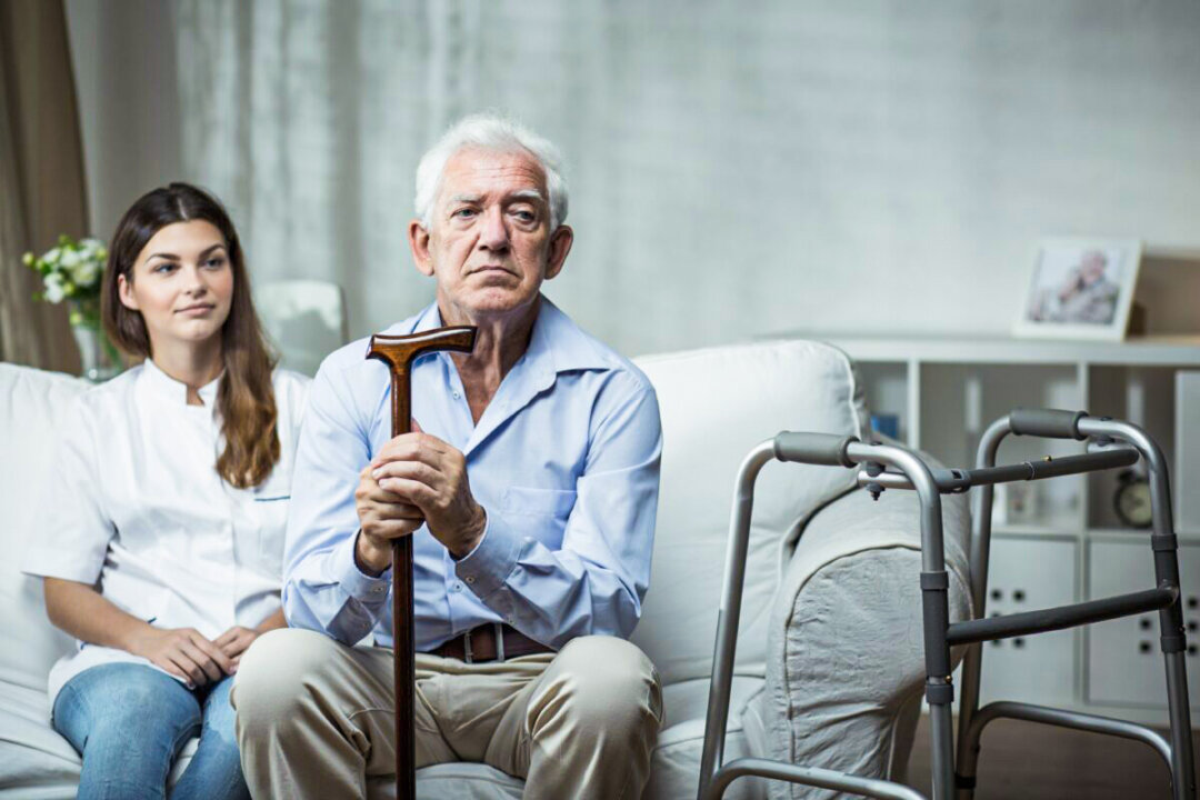 Elder man is very sad in the retirement home
