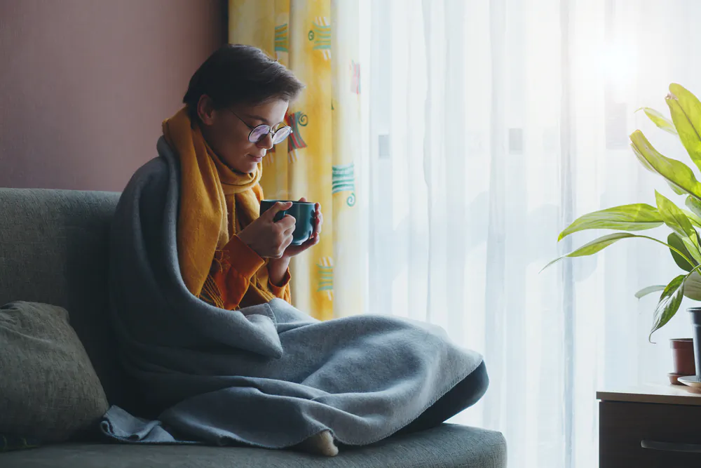What if I told you there are some sneaky ways you can reduce the amount of energy it takes to heat your home that won't require you to wear a down-filled, hooded parka 24 hours a day? (Alina Kruk/Shutterstock)