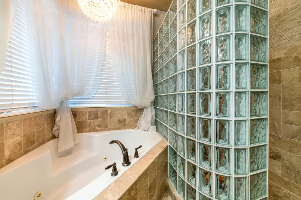 Glass block walls can give a house a very open look and make smaller rooms appear to be much larger than they are. (Jason Finn/Shutterstock)