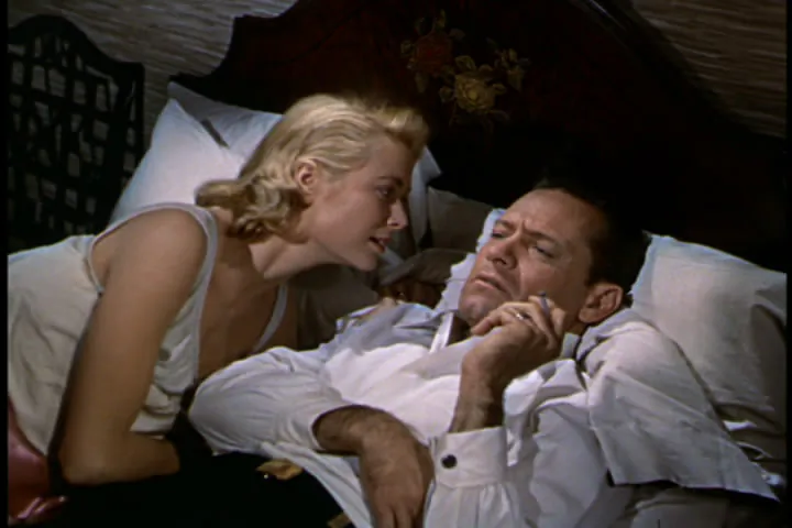 Nancy (Grace Kelly) is concerned that the bombing mission her husband Lt. Harry Brubaker (William Holden) will undertake is extremely dangerous. (Public Domain)